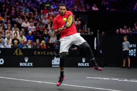 CHICAGO, IL - SEPTEMBER 22: Team World s Nick Kyrgios of Australia returns a ball to Team Europe s Roger Federer of Switzerland during a singles match on day two of the 2018 Laver Cup on September 22, 2018, at the United Center in Chicago, Illinois. Federer beats Kyrgios 6-3 6-2. (Photo by Daniel Bartel Icon Sportswire) TENNIS: SEP 22 Laver Cup Icon180922027 EDITORIAL USE ONLY
