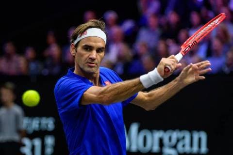 CHICAGO, IL - SEPTEMBER 22: Team Europe s Roger Federer of Switzerland returns a ball to Team World s Nick Kyrgios of Australia during a singles match on day two of the 2018 Laver Cup on September 22, 2018, at the United Center in Chicago, Illinois. Federer beats Kyrgios 6-3 6-2. (Photo by Daniel Bartel Icon Sportswire) TENNIS: SEP 22 Laver Cup Icon180922032 EDITORIAL USE ONLY