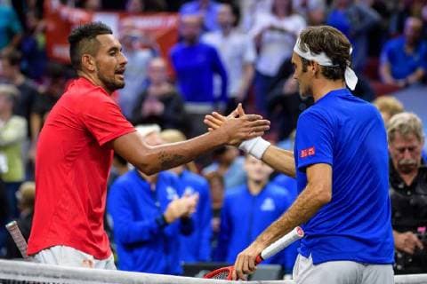 CHICAGO, IL - SEPTEMBER 22: Team World s Nick Kyrgios of Australia and Team Europe s Roger Federer of Switzerland shake hands after a singles match on day two of the 2018 Laver Cup on September 22, 2018, at the United Center in Chicago, Illinois. Federer beats Kyrgios 6-3 6-2. (Photo by Daniel Bartel Icon Sportswire) TENNIS: SEP 22 Laver Cup Icon180922038 EDITORIAL USE ONLY
