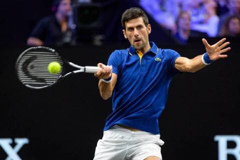 CHICAGO, IL - SEPTEMBER 22: Team Europe s Novak Djokovic of Serbia returns a ball to Team World s Kevin Anderson of South Africa during a singles match on day two of the 2018 Laver Cup on September 22, 2018, at the United Center in Chicago, Illinois. Anderson beats Djokovic 7-6(5) 5-7 10-6 . (Photo by Daniel Bartel Icon Sportswire) TENNIS: SEP 22 Laver Cup Icon180922041 EDITORIAL USE ONLY