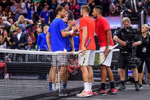 CHICAGO, IL - SEPTEMBER 22: Team Europe s Grigor Dimitrov of Bulgaria, Team Europe s David Goffin of Belgium, Team World s Jack Sock of the United States of America, and Team World s Nick Kyrgios of Australia shake hands after a doubles match on day two of the 2018 Laver Cup on September 22, 2018, at the United Center in Chicago, Illinois. Sock & Kyrgios beat Goffin & Dimitrov 6-3 6-4. (Photo by Daniel Bartel Icon Sportswire) TENNIS: SEP 22 Laver Cup Icon180922079 EDITORIAL USE ONLY
