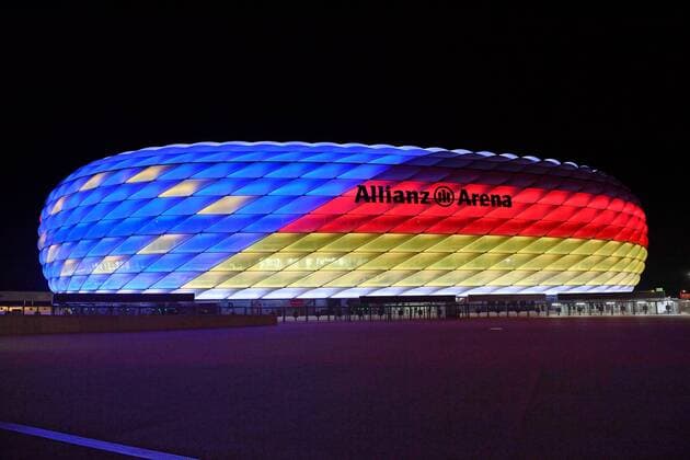 Special illumination of the ALLIANZ ARENA FC Bayern Muenchen and the Bundesliga support the bid to host the UEFA EURO 2024 Football Arena Football Stadium FC Bayern Muenchen Night shot Evening sky Night sky illuminated Light Mood Evening mood Overview Total architecture