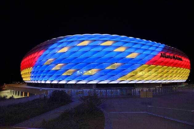 Special illumination of the ALLIANZ ARENA FC Bayern Muenchen and the Bundesliga support the bid to host the UEFA EURO 2024 Football Arena Football Stadium FC Bayern Muenchen Night shot Evening sky Night sky illuminated Light Mood Evening mood Overview Total architecture