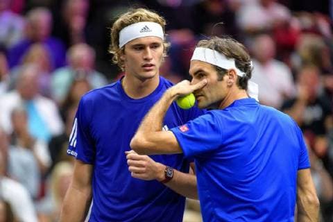CHICAGO, IL - SEPTEMBER 23: Team Europe s Alexander Zverev of Germany and Team Europe s Roger Federer of Switzerland talk strategy during a doubles match on day three of the 2018 Laver Cup on September 23, 2018, at the United Center in Chicago, Illinois. Sock & Isner beats Federer & Zverev 4-6, 7-6(2), 11-9 . (Photo by Daniel Bartel Icon Sportswire) TENNIS: SEP 23 Laver Cup Icon180923009 EDITORIAL USE ONLY