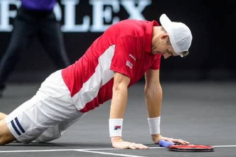 CHICAGO, IL - SEPTEMBER 23: Team World s John Isner of the United States of America takes a moment getting up during a singles match on day three of the 2018 Laver Cup on September 23, 2018, at the United Center in Chicago, Illinois. Federer beats Isner 6-7 (5) 7-6 (8) 10-7 . (Photo by Daniel Bartel Icon Sportswire) TENNIS: SEP 23 Laver Cup Icon180923027 EDITORIAL USE ONLY