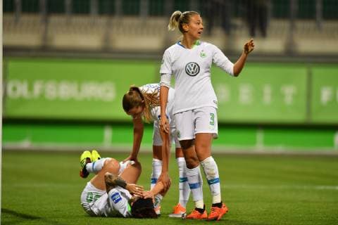 Ella Masar McLeod Wolfsburg 30 are down in pain after their 2 0 Noelle Maritz Wolfsburg 16 and Zsanett Jakabfi Wolfsburg 3 are in their Football UWCL Champions League VFL Wolfsburg Thor KA xmkx