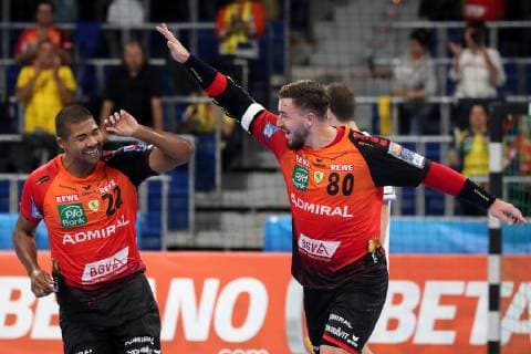 v left Mads Mensah Larsen RNL 22 Jannik Kohlbacher RNL 80 celebrate a goal Jubilee Torjubel Goalkeeping celebrate the goal goal celebration Cheering over the goal optimistic Action Action Handball Champions League Rhein Neckar Löwen HC Meshkov Brest xozx