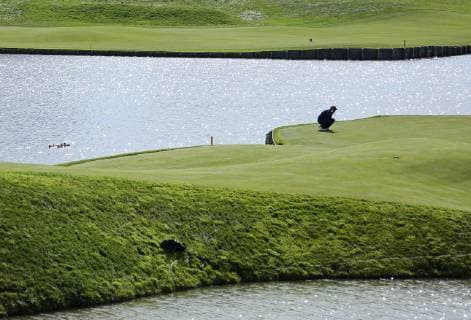 Tiger Woods reads the 15th green on day two of the Ryder Cup at Le Golf National in Guyancourt near Paris on September 29, 2018. Woods and teammate Patrick Reed lost their match to Francesco Molinari and Tommy Fleetwood 4 & 3.  PAR20180929021 DAVIDxSILPA