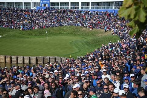 Fans look at the video screen between the action on day two of the Ryder Cup at Le Golf National in Guyancourt near Paris on September 29, 2018. Team Europe leads Team USA 10-6 heading into the final day of competition.  PAR20180929099 DAVIDxSILPA