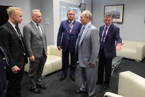 SOCHI, RUSSIA - SEPTEMBER 30, 2018: Force India driver Nikita Mazepin, URALCHEM Board Chairman Dmitry Mazepin, VTB Management Board President and Chairman Andrei Kostin, Russia s President Vladimir Putin, and Deputy Prime Minister Dmitry Kozak (L-R) attend the 2018 Formula One Russian Grand Prix final day events at the Sochi Autodrom racing circuit. Mikhail Klimentyev Russian Presidential Press and Information Office TASS  TS092056