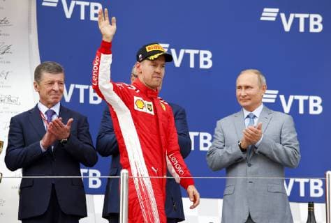Motorsports: FIA Formula One World Championship WM Weltmeisterschaft 2018, Grand Prix of Russia, , 5 Sebastian Vettel (GER, Scuderia Ferrari) Vladimir Putin, President of Russia on the podium Sochi Russia