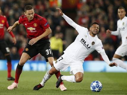 Nemanja Matic of Manchester United ManU tackles Francis Coquelin of Valencia during the UEFA Champions League Group H match at Old Trafford Stadium, Manchester. Picture date: 2nd September 2018. Picture credit should read: Andrew Yates Sportimage EDITORIAL USE ONLY. No use with unauthorised audio, video, data, fixture lists, club league logos or live services. Online in-match use limited to 120 images, no video emulation. No use in betting, games or single club league player publications.