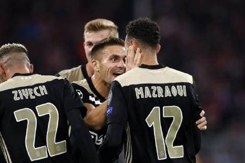 (l-r) Dusan Tadic of Ajax, Noussair Mazraoui of Ajax during the UEFA Champions League group E match between Bayern Munich and Ajax Amsterdam at the Allianz Arena on October 02, 2018 in Munich, Germany UEFA Champions League 2018 2019 xVIxVIxImagesx xTomxBodexMultimediaxIVx 12325243