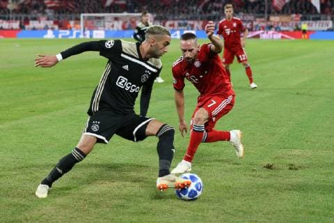 In action with Hakim Ziyech 22 Ajax Amsterdam and Franck Ribery 7 FC Bayern Muenchen FC Bayern Munich vs Ajax Amsterdam Football Preliminary Round Champions League 02 10 2018 Muenchen Bayern Germany Copyright: xkolbert-press ChristianxKolbertx