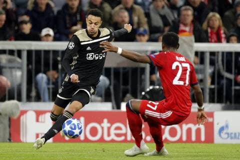 (l-r) Noussair Mazraoui of Ajax, David Alaba of FC Bayern Munchen during the UEFA Champions League group E match between Bayern Munich and Ajax Amsterdam at the Allianz Arena on October 02, 2018 in Munich, Germany UEFA Champions League 2018 2019 xVIxVIxImagesx xTomxBodexMultimediaxIVx 12325460