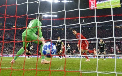 02 10 2018 Football UEFA Champions League 2018 2019 Group Stage 2 Gameday FC Bayern Munich Ajax Amsterdam in the Allianz Arena Munich Headshot to 1 0 by Mats Hummels re Bayern Munich v Keeper Andre Onana Ajax Amsterdam DFL and DFB regulations prohibit any use of photographs as image sequences and or quasi video