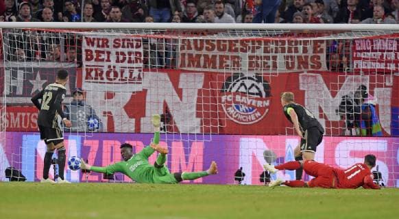 02 10 2018 Football UEFA Champions League 2018 2019 Group Stage 2 Gameday FC Bayern Munich Ajax Amsterdam in the Allianz Arena Munich Goalkeeper Andre Onana left Ajax Amsterdam scored the shot on goal by James Rodriguez re Bayern Munich DFL and DFB regulations prohibit any use of photographs as image sequences and or quasi video