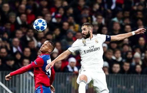 MOSCOW, RUSSIA - OCTOBER 2, 2018: CSKA Moscow s Rodrigo Becao (L) and Real Madrid s Karim Benzema in action in their 2018 19 UEFA Champions League Group G Round 2 football match at Luzhniki Stadium. Anton Novoderezhkin TASS  TS0923E7