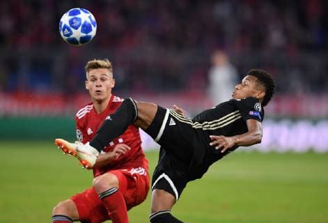 FOOTBALL CHAMPIONS LEAGUE SEASON 2018 2019 GROUP PHASE FC Bayern Muenchen Ajax Amsterdam 02 10 2018 David Neres Ajax Amsterdam ahead of Joshua Kimmich FC Bayern Muenchen