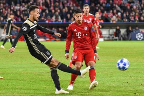 Noussair Mazraoui Ajax Amsterdam 12 clears James Rodriguez FC Bayern Muenchen 11 FC Bayern Muenchen Ajax Amsterdam Soccer Champions League 02 10 2018 Muenchen Bayern Germany Copyright: xkolbert-press BurghardxSchreyerx