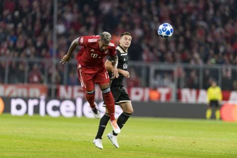 Soccer Champions League Match FC Bayern Munich vs Ajax Amsterdam Allianz Arena Muenchen 02 10 2018 Pictured Jerome Boateng Dusan Tadic Â