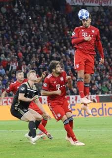 Champions League Match FC Bayern Munich Ajax Amsterdam 1 1 Head by Mats Hummels left Javi Martinez DFL regulations prohibit any use of images Munich Bayern Germany Allianz Arena