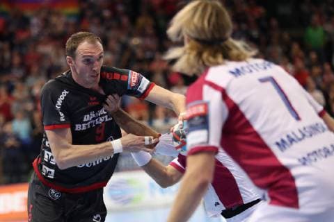 EHF Champions League group stage 03 10 18 Holger Glandorf SG Flensburg Handewitt 09 against Aidenas Malasinskas HC Motor Zaporozhye 07 and Igor Soroka HC Motor Zaporozhye 44 xmmkx