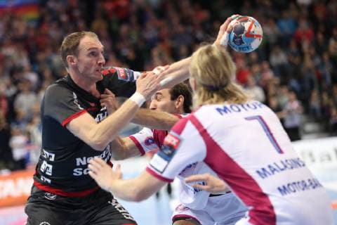 EHF Champions League Group Stage 03 10 18 Holger Glandorf SG Flensburg Handewitt 09 against Igor Soroka HC Motor Zaporozhye 44 and Aidenas Malasinskas HC Motor Zaporozhye 07 xmmkx
