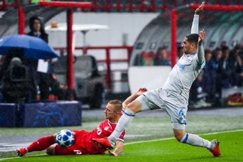 MOSCOW, RUSSIA â€“ OCTOBER 3, 2018: Lokomotiv Moscow s Dmitry Barinov (L) and FC Schalke 04 s Omar Mascarell in action in their 2018 19 UEFA Champions League Group D Round 2 football match at RZD Arena Stadium. Sergei Fadeichev TASS  TS092677