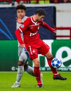 MOSCOW, RUSSIA â€“ OCTOBER 3, 2018: FC Schalke 04 s Weston McKennie (L) and Lokomotiv Moscow s Grzegorz Krychowiak in action in their 2018 19 UEFA Champions League Group D Round 2 football match at RZD Arena Stadium. Sergei Fadeichev TASS  TS09267E