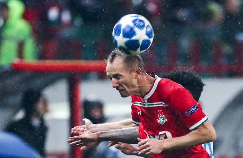 MOSCOW, RUSSIA â€“ OCTOBER 3, 2018: Lokomotiv Moscow s Vladislav Igantyev heads the ball in the 2018 19 UEFA Champions League Group D Round 2 football match against FC Schalke 04 at RZD Arena Stadium. Sergei Fadeichev TASS  TS092683
