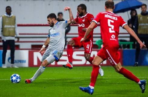 MOSCOW, RUSSIA â€“ OCTOBER 3, 2018: FC Schalke 04 s Daniel Caligiuri and Lokomotiv Moscow s Manuel Fernandes, Benedikt Howedes (L-R) in action in their 2018 19 UEFA Champions League Group D Round 2 football match at RZD Arena Stadium. FC Schalke 04 won the game 1:0. Sergei Fadeichev TASS  TS0926A1
