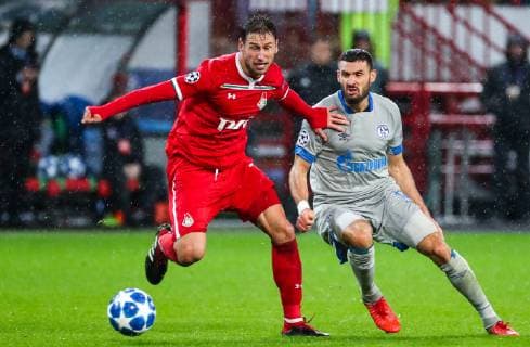 MOSCOW, RUSSIA â€“ OCTOBER 3, 2018: Lokomotiv Moscow s Grzegorz Krychowiak (L) and FC Schalke 04 s Daniel Caligiuri in action in their 2018 19 UEFA Champions League Group D Round 2 football match at RZD Arena Stadium. FC Schalke 04 won the game 1:0. Sergei Fadeichev TASS  TS0926A5