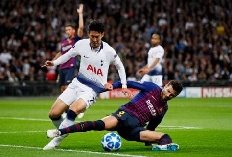 Barcelona s Gerard Pique tackles Tottenham s Son Heung-Min during the UEFA Champions League Group B match at Wembley Stadium, London. Picture date: 3rd October 2018. Picture credit should read: David Kein Sportimage EDITORIAL USE ONLY. No use with unauthorised audio, video, data, fixture lists, club league logos or live services. Online in-match use limited to 120 images, no video emulation. No use in betting, games or single club league player publications.