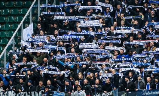 MOSCOW, RUSSIA â€“ OCTOBER 3, 2018: FC Schalke 04 s supporters cheer in their 2018 19 UEFA Champions League Group D Round 2 football match against FC Lokomotiv Moscow at RZD Arena Stadium. FC Schalke 04 won the game 1:0. Sergei Fadeichev TASS  TS0926BC