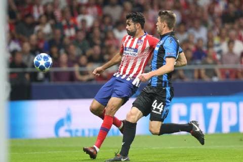 Atletico s Diego Costa and Club s Brandon Mechele fight for the ball during the match between Belgian soccer team Club Brugge KV and Atletico Madrid, in group A on day two the UEFA Champions League, in Mardid, Spain, Wednesday 03 October 2018. BRUNOxFAHY  x05440144x