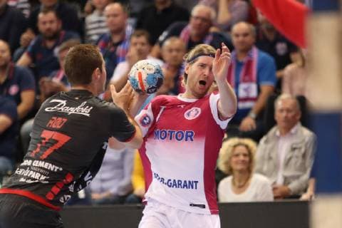SG Flensburg Handewitt vs HC Motor Zaporozhye Handball EHF Champions League Group Stage 03 10 18 Aidenas Malasinskas HC Motor Zaporozhye 07 against Magnus Roed SG Flensburg Handewitt 77 xmmkx