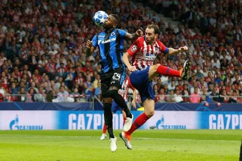 Club s Stefano Denswil and Atletico s Diego Roberto Godin fight for the ball during the match between Belgian soccer team Club Brugge KV and Atletico Madrid, in group A on day two the UEFA Champions League, in Mardid, Spain, Wednesday 03 October 2018. BRUNOxFAHY  x05440159x