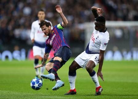 3rd October 2018, Wembley Stadium, London England; UEFA Champions League football, Tottenham Hotspur versus Barcelona; Victor Wanyama of Tottenham Hotspur challenges Lionel Messi of Barcelona from behind  ActionPlus12067653 JohnxPatrickxFletcher