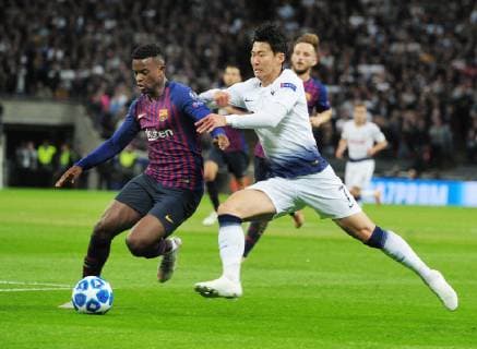 Football - 2018 2019 UEFA Champions League - Group B: Tottenham Hotspur vs. Barcelona Heung - Min Son of Tottenham and Nelson Semedo, at Wembley Stadium. COLORSPORT ANDREW COWIE 
