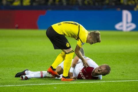 UEFA CL Borussia Dortmund vs AS Monaco 03 10 2018 Signal Iduna Park Dortmund GER UEFA CL Borussia Dortmund vs AS Monaco UEFA REGULATIONS PROHIBIT ANY USE OF PHOTOGRAPH AS IMAGE SEQUENCES AND OR QUASI VIDEO pictured picture shows Marco Reus Borussia Dortmund 11 is injured Kamil Glik AS Monaco 25 he accidentally shot nordphotox xRauch nph00251