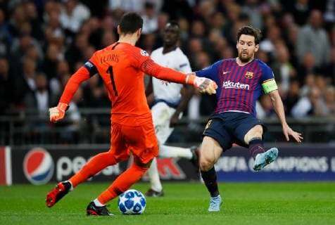Tottenham s Hugo Lloris clears the ball under pressure from Barcelona s Lionel Messi during the UEFA Champions League Group B match at Wembley Stadium, London. Picture date: 3rd October 2018. Picture credit should read: David Kein Sportimage EDITORIAL USE ONLY. No use with unauthorised audio, video, data, fixture lists, club league logos or live services. Online in-match use limited to 120 images, no video emulation. No use in betting, games or single club league player publications.