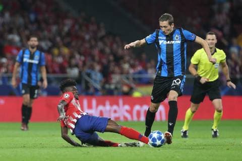 Atletico s Thomas Teye Partey and Club s Hans Vanaken fight for the ball during the match between Belgian soccer team Club Brugge KV and Atletico Madrid, in group A on day two the UEFA Champions League, in Mardid, Spain, Wednesday 03 October 2018. BRUNOxFAHY  x05440223x