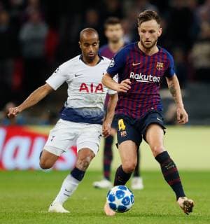 Barcelona s Ivan Rakitic and Tottenham s Lucas Moura during the UEFA Champions League Group B match at Wembley Stadium, London. Picture date: 3rd October 2018. Picture credit should read: David Kein Sportimage EDITORIAL USE ONLY. No use with unauthorised audio, video, data, fixture lists, club league logos or live services. Online in-match use limited to 120 images, no video emulation. No use in betting, games or single club league player publications.