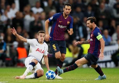 Tottenham s Harry Winks tackles Barcelona s Lionel Messi during the UEFA Champions League Group B match at Wembley Stadium, London. Picture date: 3rd October 2018. Picture credit should read: David Kein Sportimage EDITORIAL USE ONLY. No use with unauthorised audio, video, data, fixture lists, club league logos or live services. Online in-match use limited to 120 images, no video emulation. No use in betting, games or single club league player publications.