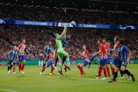 Atletico s Jan Oblak and Club s Stefano Denswil fight for the ball during the match between Belgian soccer team Club Brugge KV and Atletico Madrid, in group A on day two the UEFA Champions League, in Mardid, Spain, Wednesday 03 October 2018. BRUNOxFAHY  x05440300x