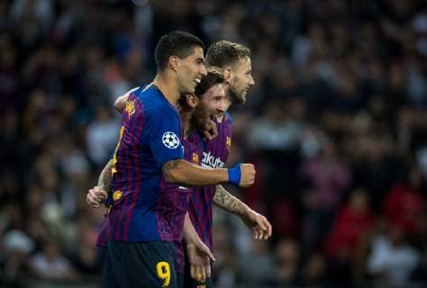 Lionel Messi celebrates his first goal with Luis Suarez (9) & Ivan Rakiti? of Barcelona during the UEFA Champions League group match between Tottenham Hotspur and Barcelona at Wembley Stadium, London, England on 3 October 2018. Copyright: xAndyxRowlandx PMI-2289-0008
