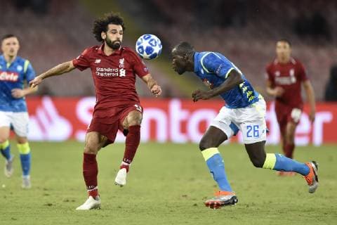 Mohamed Salah of Liverpool is challenged by Kalidou Koulibaly of Napoli during the UEFA Champions League group C match between SSC Napoli and Liverpool FC at Stadio San Paolo, Naples, Italy on 3 October 2018. Copyright: xGiuseppexMaffiax 21350023