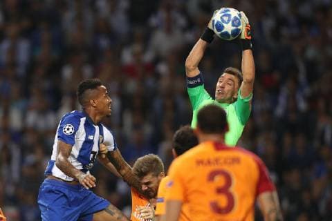 October 3, 2018 - Lisbon, Porto, Portugal - Fernando Muslera goalkeeper of Galatasaray (R) in action with Porto s Brazilian defender Eder Militao (L) during the UEFA Champions League, match between FC Porto and Galatasaray, at Dragao Stadium in Porto on October 3, 2018 in Porto, Portugal. FC Porto v Galatasaray - UEFA Champions League Group D  - ZUMAn230 20181003_zaa_n230_260 Copyright: xDpix