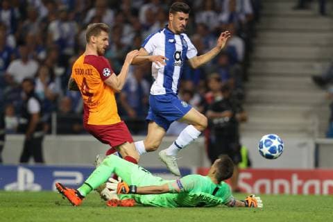 October 3, 2018 - Lisbon, Porto, Portugal - Porto s Portuguese forward Andre Pereira (C) in action with Serdar Aziz defender of Galatasaray (L) and Fernando Muslera goalkeeper of Galatasaray (R) during the UEFA Champions League, match between FC Porto and Galatasaray, at Dragao Stadium in Porto on October 3, 2018 in Porto, Portugal. FC Porto v Galatasaray - UEFA Champions League Group D  - ZUMAn230 20181003_zaa_n230_257 Copyright: xDpix